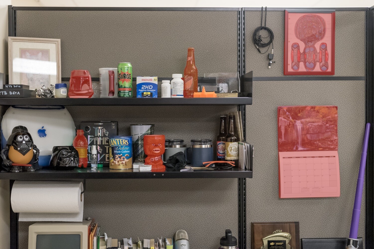 Lightroom Object Selection, several objects on office shelves including soda bottles, coffee mugs, and figurines. Six of the objects have red masking overlays.