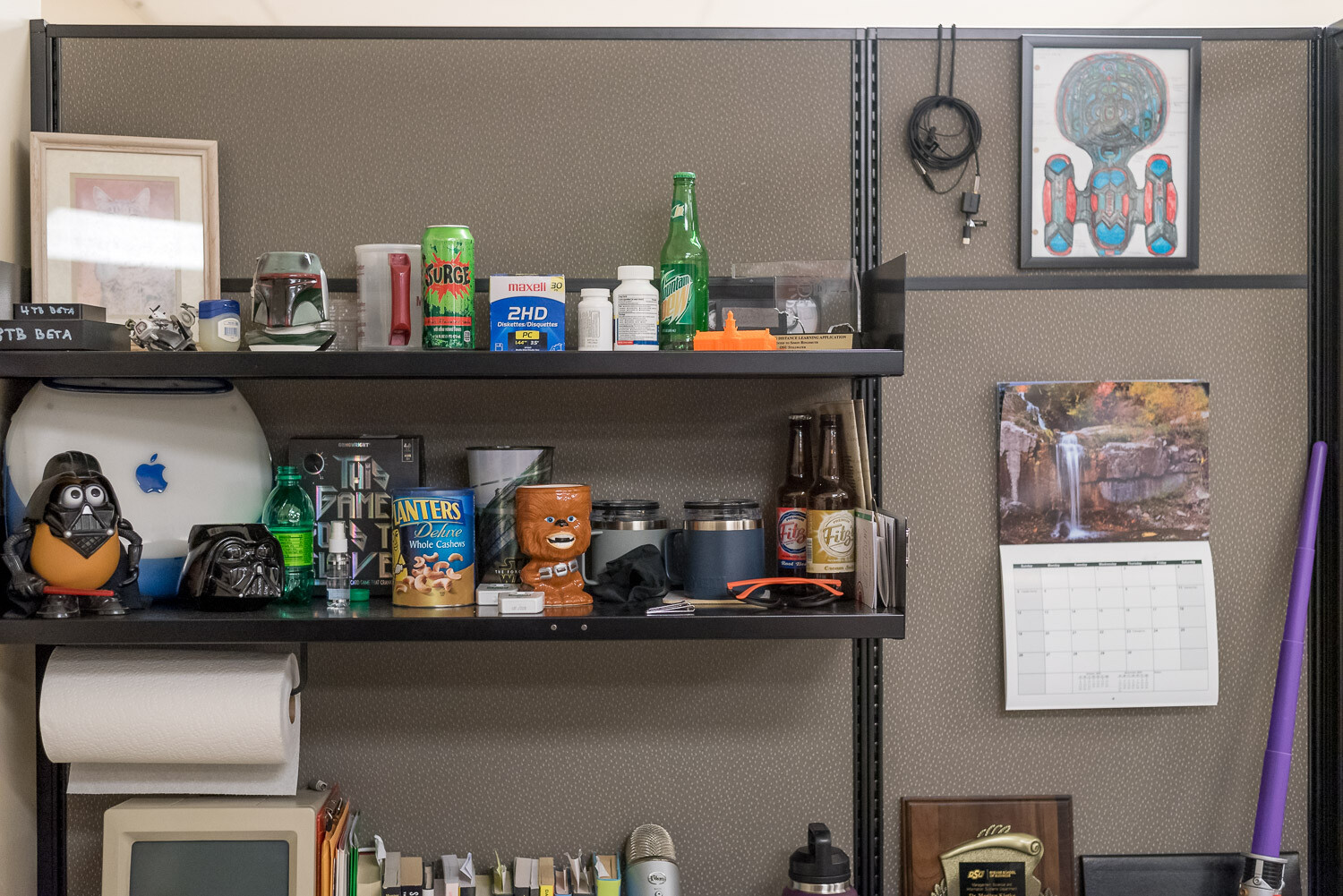 Lightroom Object Selection, several objects on office shelves including soda bottles, coffee mugs, and figurines.